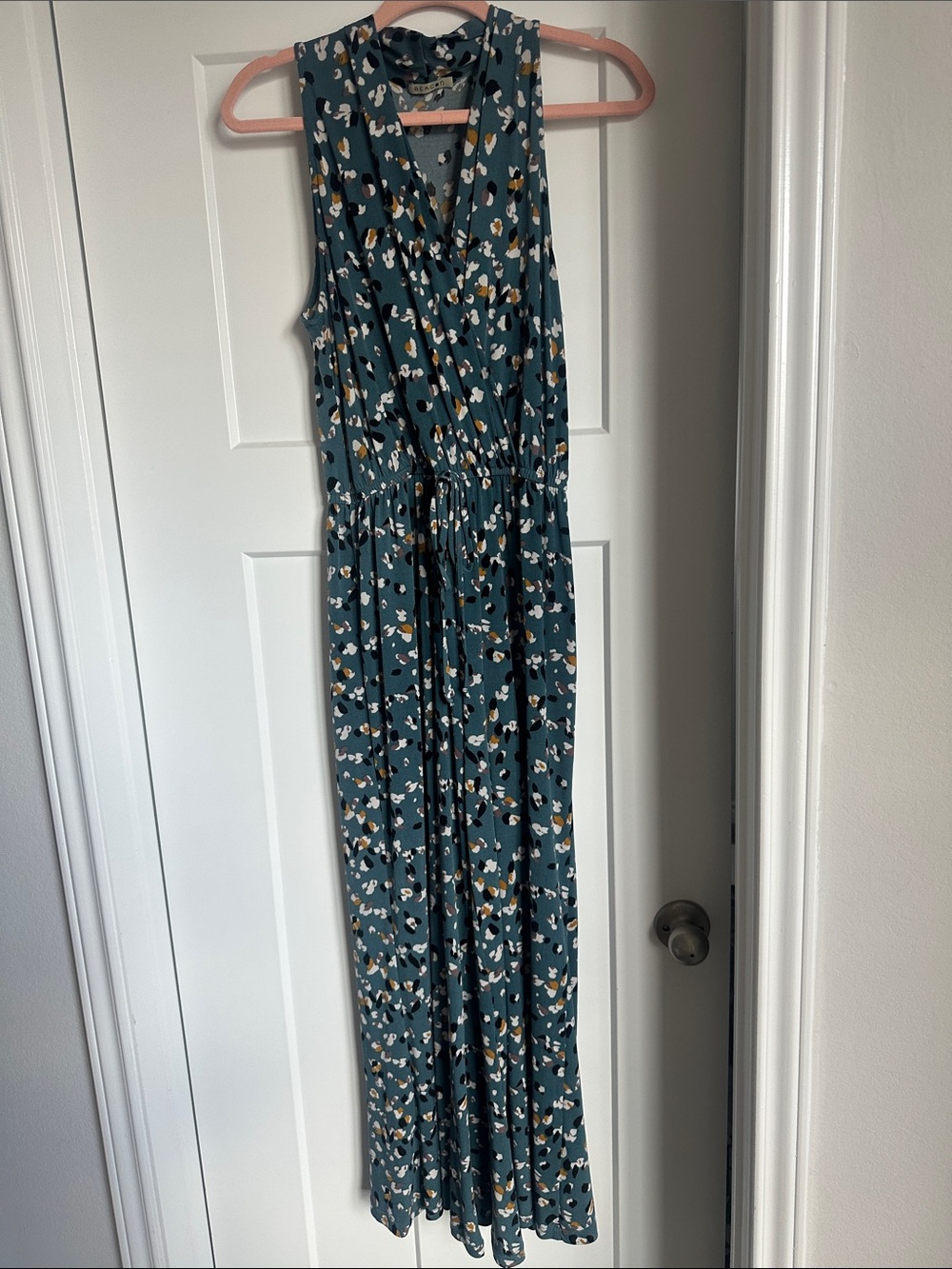 Beacon Teal Floral Sleeveless Jumpsuit with Tie Waist